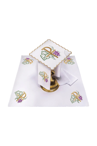 Juego de paños con motivo de cruz y uvas.